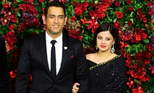 Ms-Dhoni-and-Sakshi-Singh-min